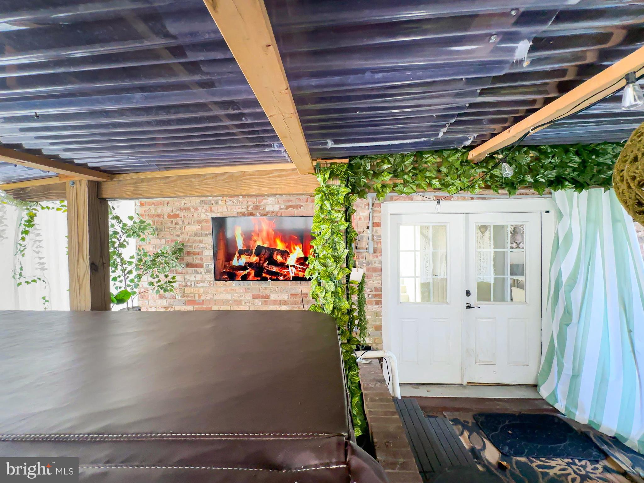 8504 Heatherwick Drive Brandywine, MD 20613 - Photo 41 of 51 a view of a porch with furniture and a yard