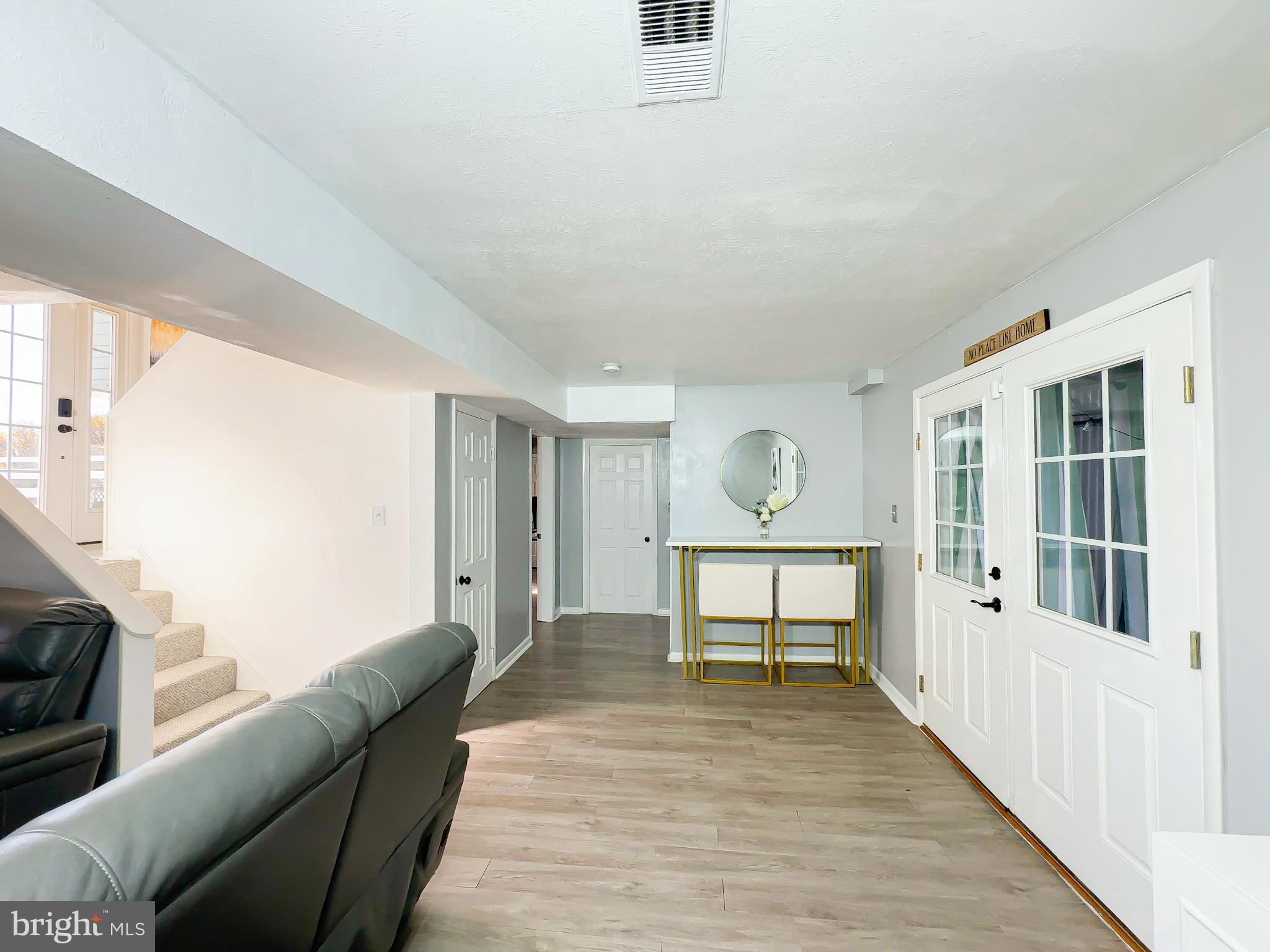 8504 Heatherwick Drive Brandywine, MD 20613 - Photo 9 of 51 a living room with furniture and a window