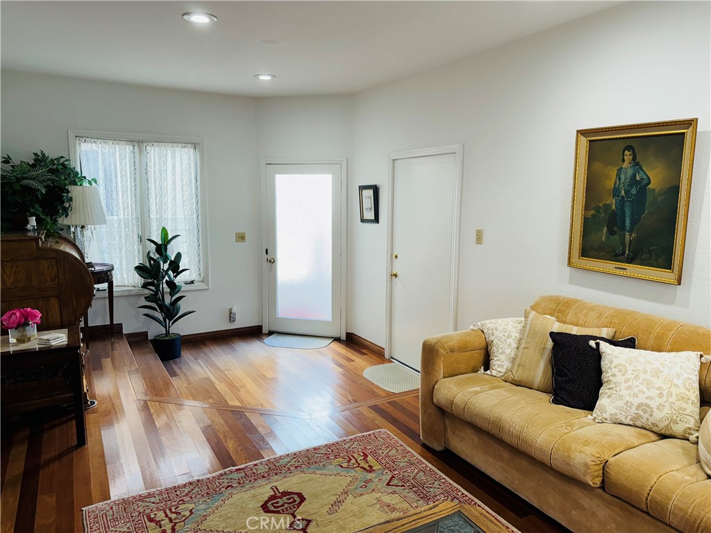 87 Rivo Alto Canal Long Beach, CA 90803 - Photo 14 of 30 a living room with furniture and wooden floor