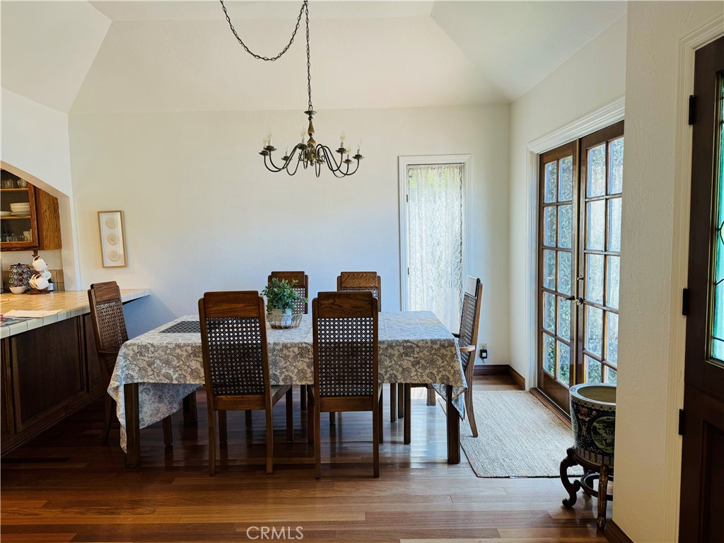 87 Rivo Alto Canal Long Beach, CA 90803 - Photo 10 of 30 a view of a dining room with furniture and wooden floor