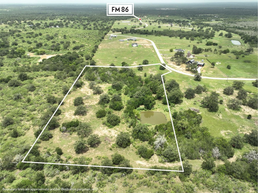 159 Starlight Path Red Rock, TX 78662 - Photo 12 of 18 a view of a tennis court