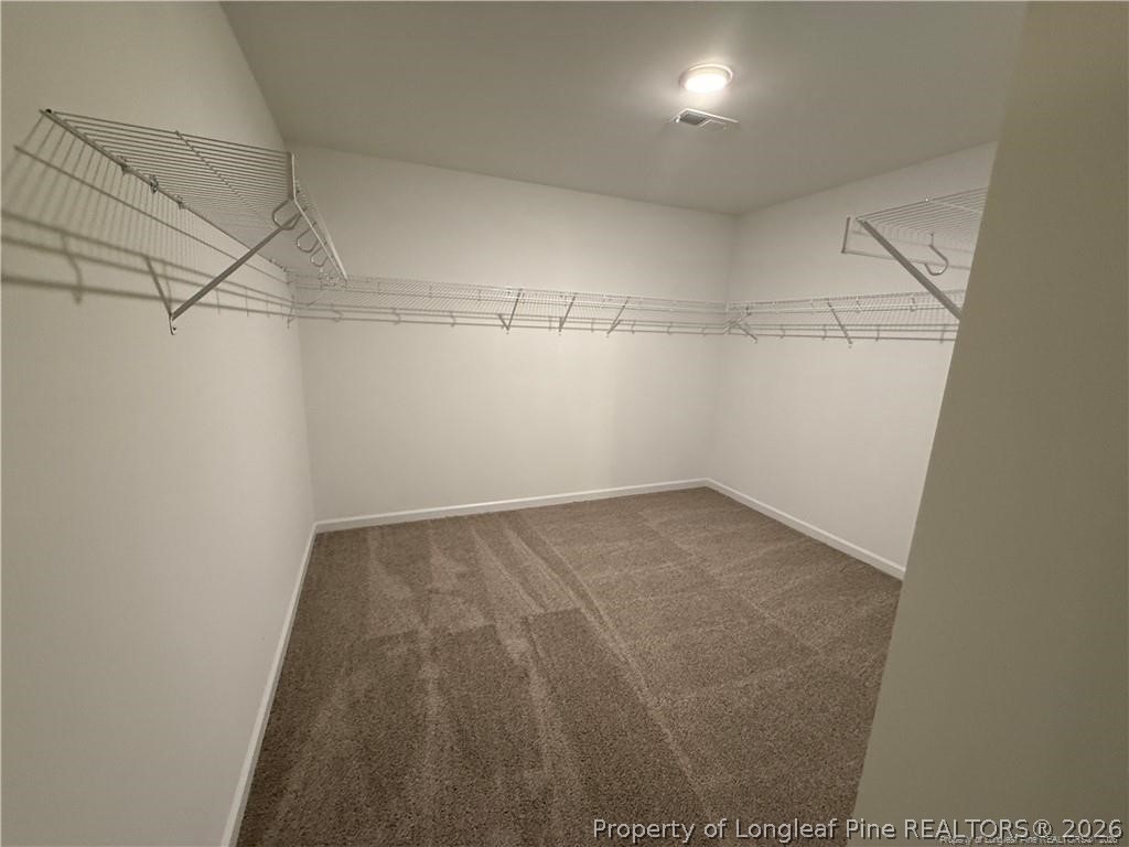 4075 Blue Springs Red Springs, NC 28377 - Photo 15 of 25 a view of a room with racks on the wall
