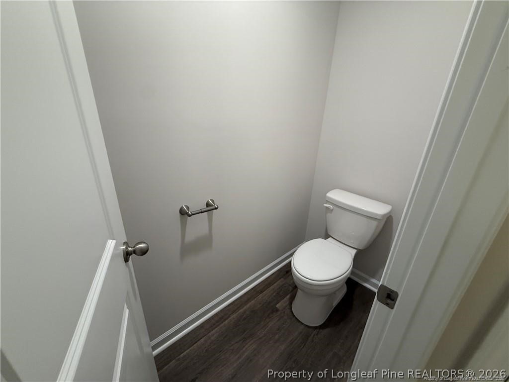 4075 Blue Springs Red Springs, NC 28377 - Photo 16 of 25 a white toilet sitting in a bathroom