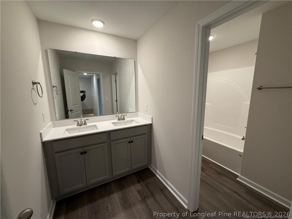4075 Blue Springs Red Springs, NC 28377 - Photo 21 of 25 a bathroom with 2 sink and a mirror