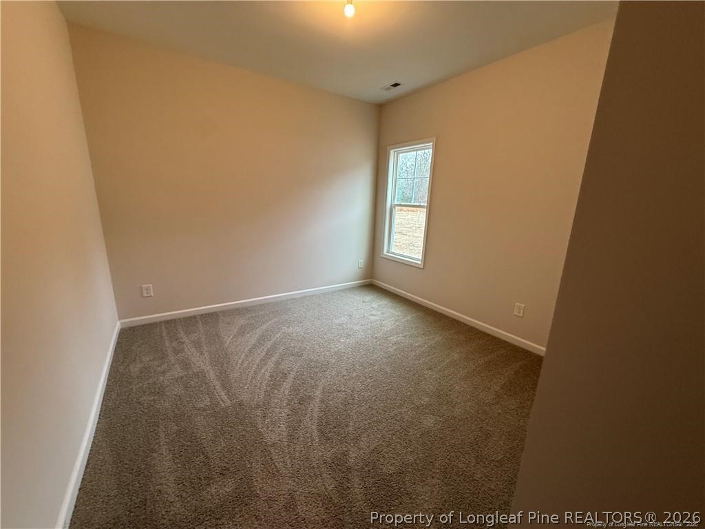 4075 Blue Springs Red Springs, NC 28377 - Photo 9 of 25 a view of room and window