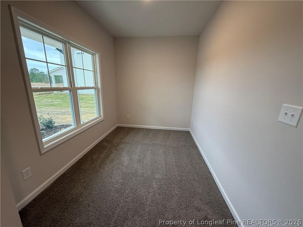 4075 Blue Springs Red Springs, NC 28377 - Photo 10 of 25 an empty room with a window