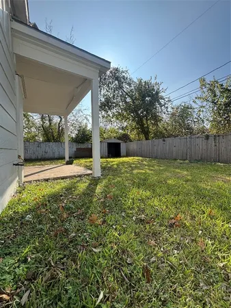 a view of a backyard with a garden