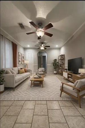 a living room with furniture and a flat screen tv