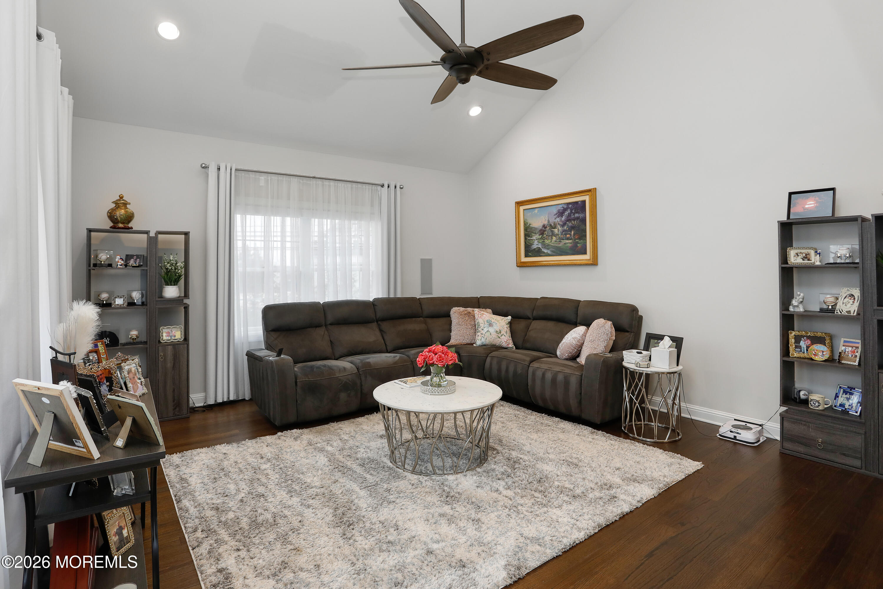 50 Neptune Road Toms River, NJ 08753 - Photo 14 of 73 a living room with furniture and a flat screen tv