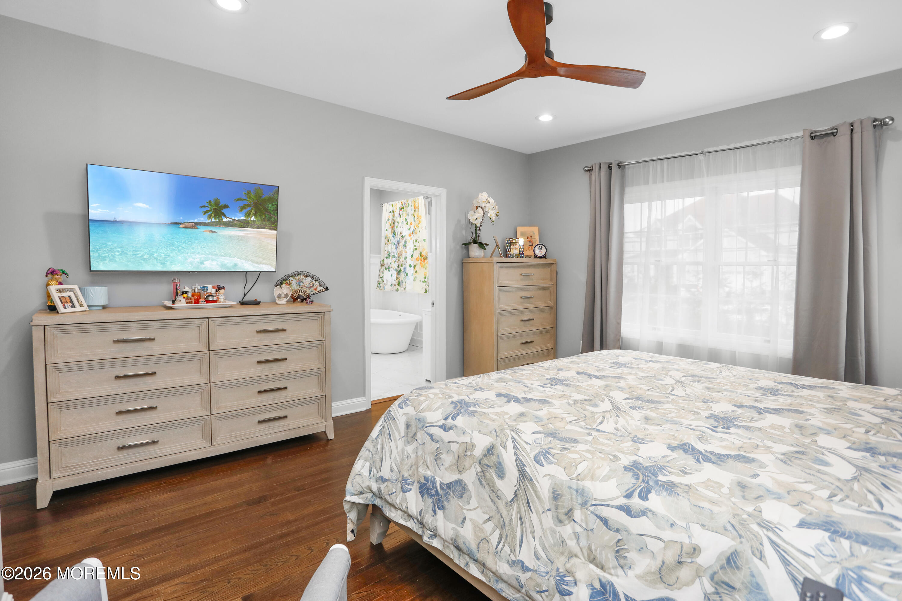 50 Neptune Road Toms River, NJ 08753 - Photo 26 of 73 a bedroom with a bed and a dresser in it