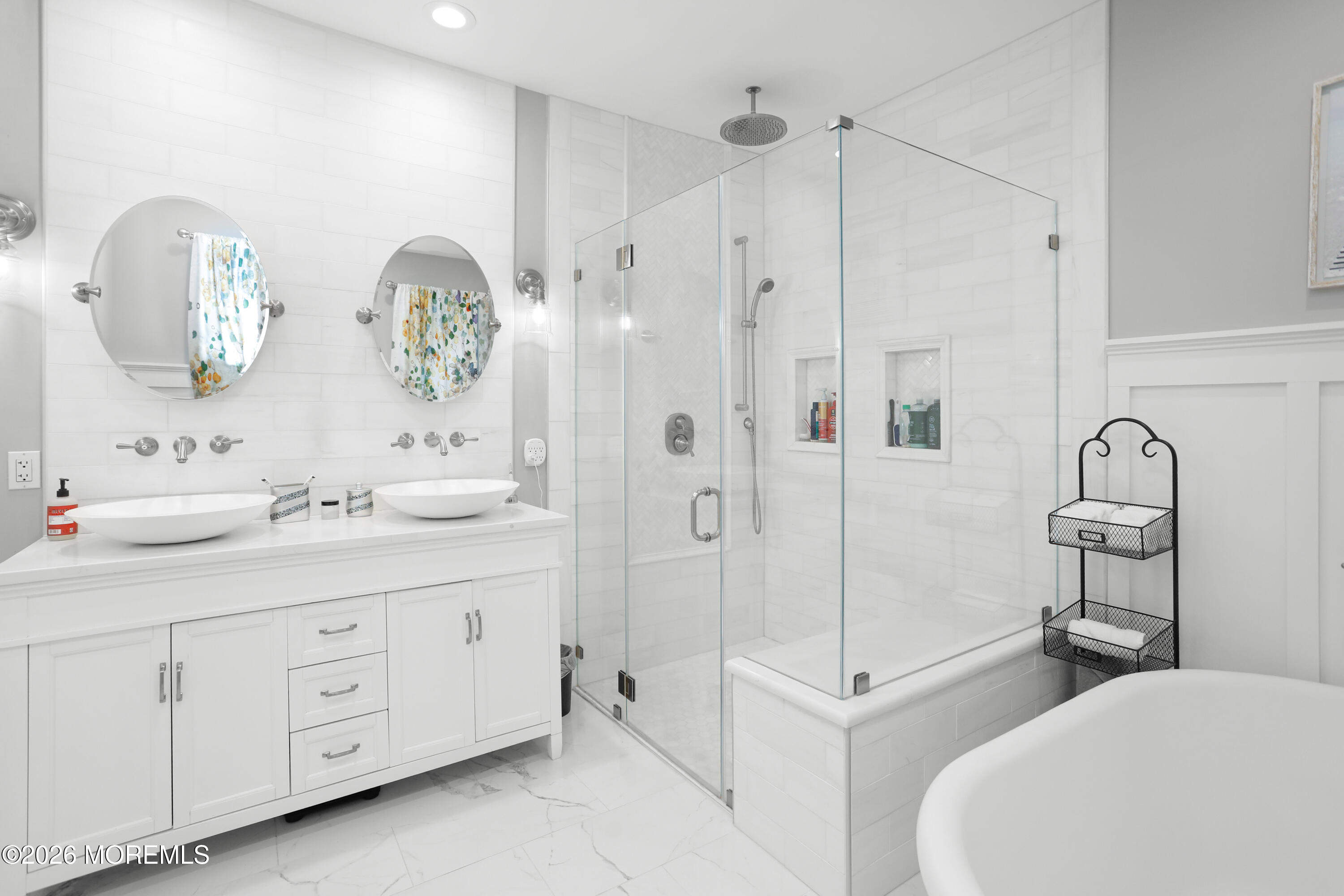 50 Neptune Road Toms River, NJ 08753 - Photo 28 of 73 a spacious bathroom with a double vanity sink a mirror a window and a shower