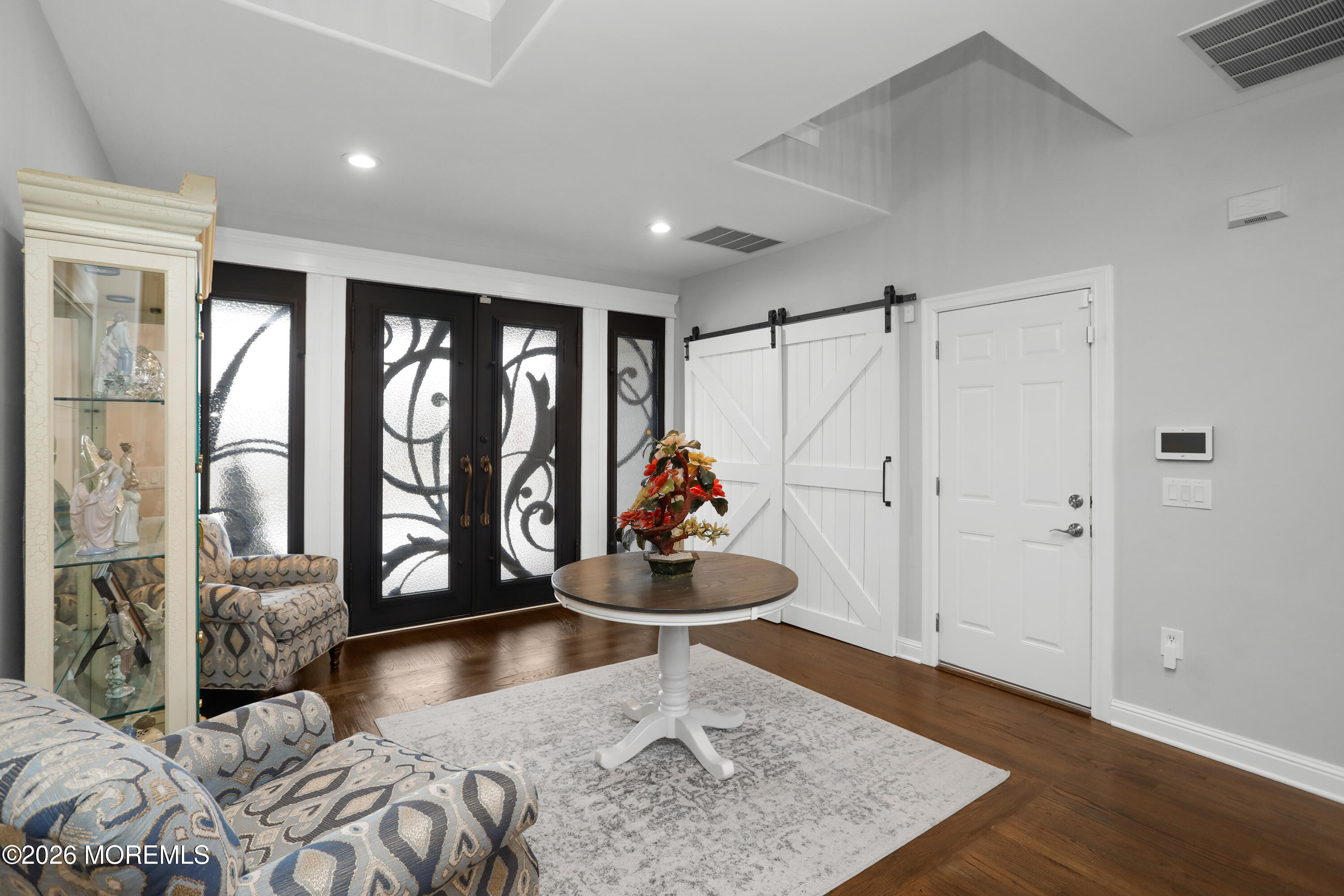 50 Neptune Road Toms River, NJ 08753 - Photo 3 of 73 a living room with furniture and a window