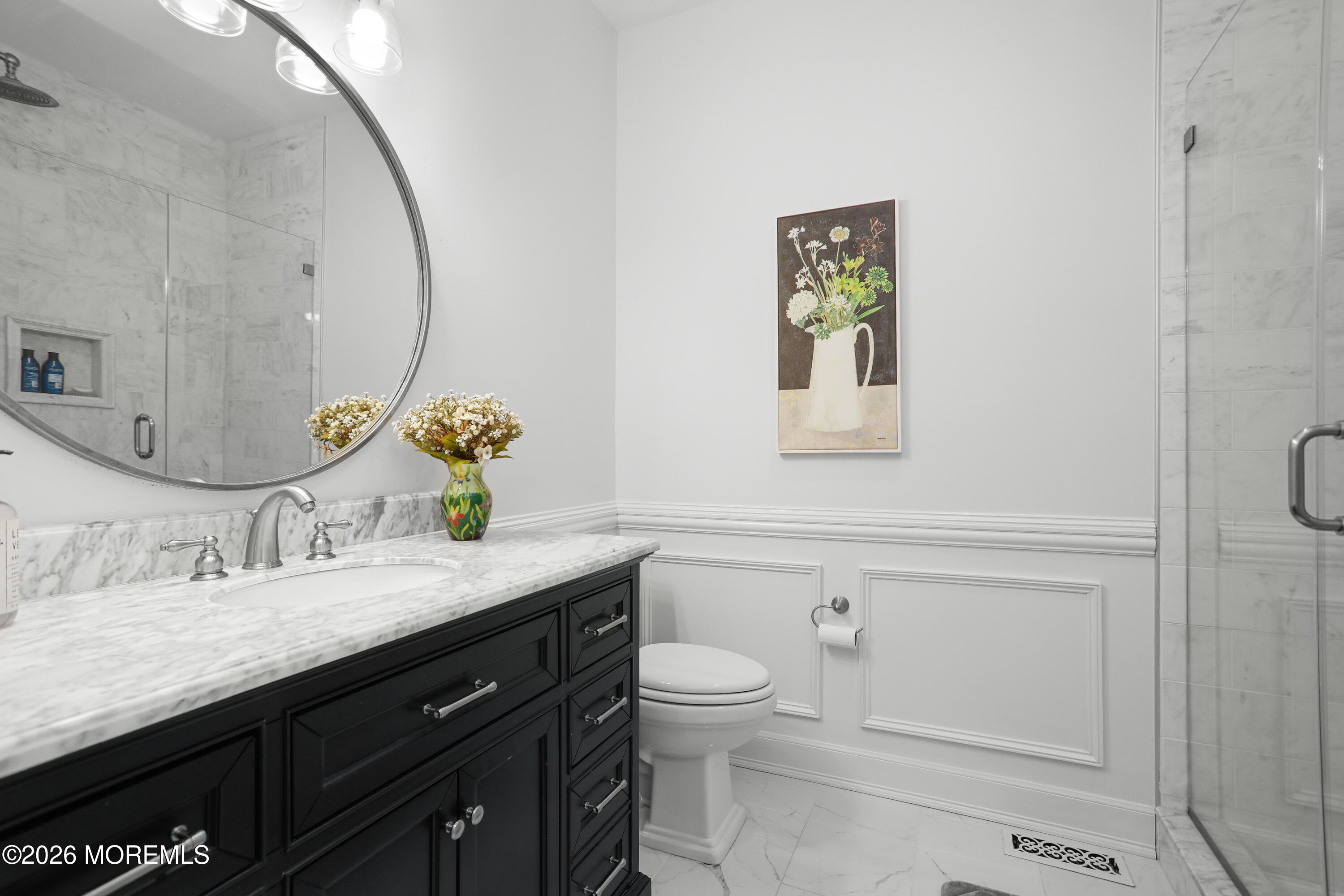 50 Neptune Road Toms River, NJ 08753 - Photo 34 of 73 a bathroom with a granite countertop sink mirror vanity and toilet