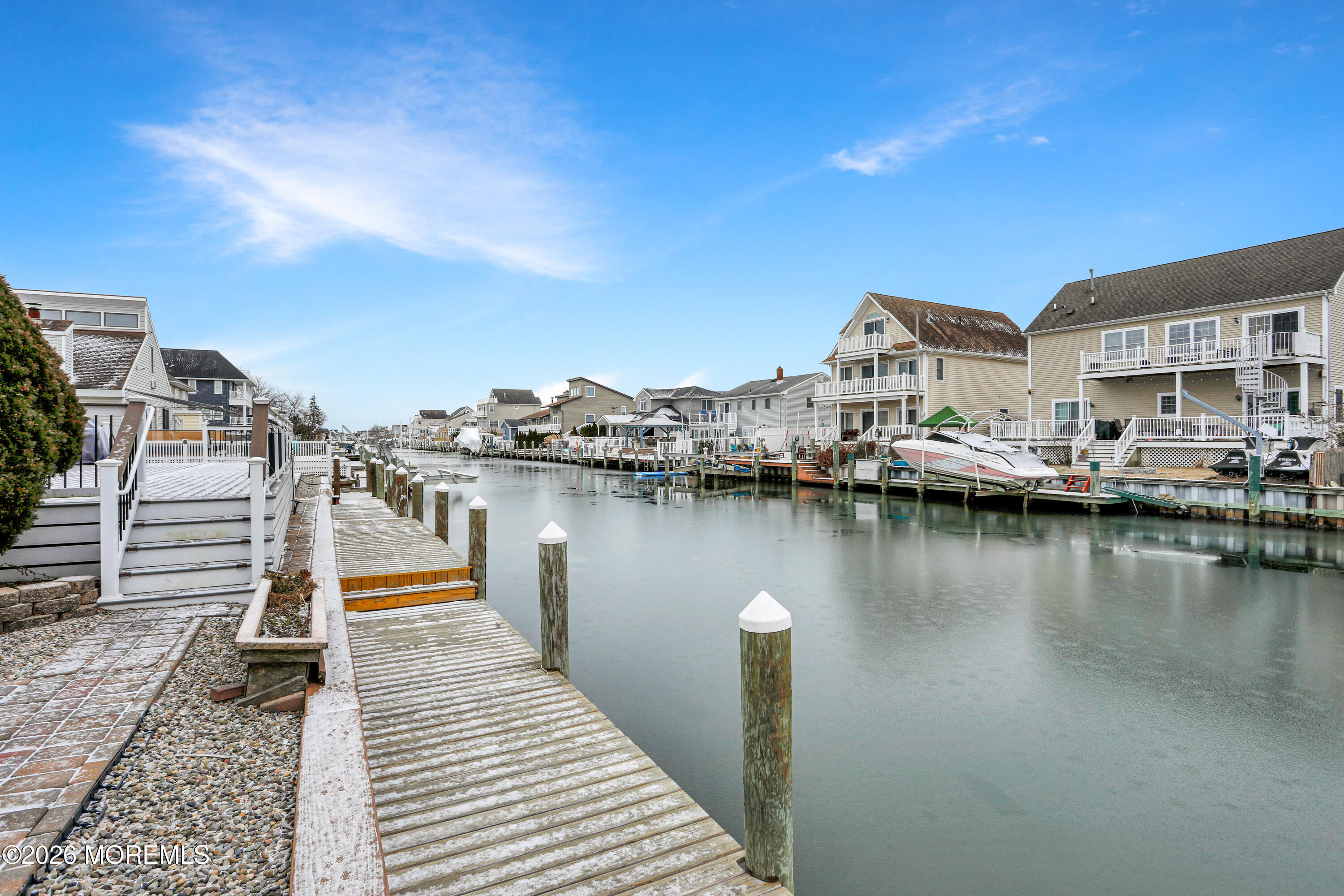 50 Neptune Road Toms River, NJ 08753 - Photo 47 of 73 a view of a lake with boats and trees in the background