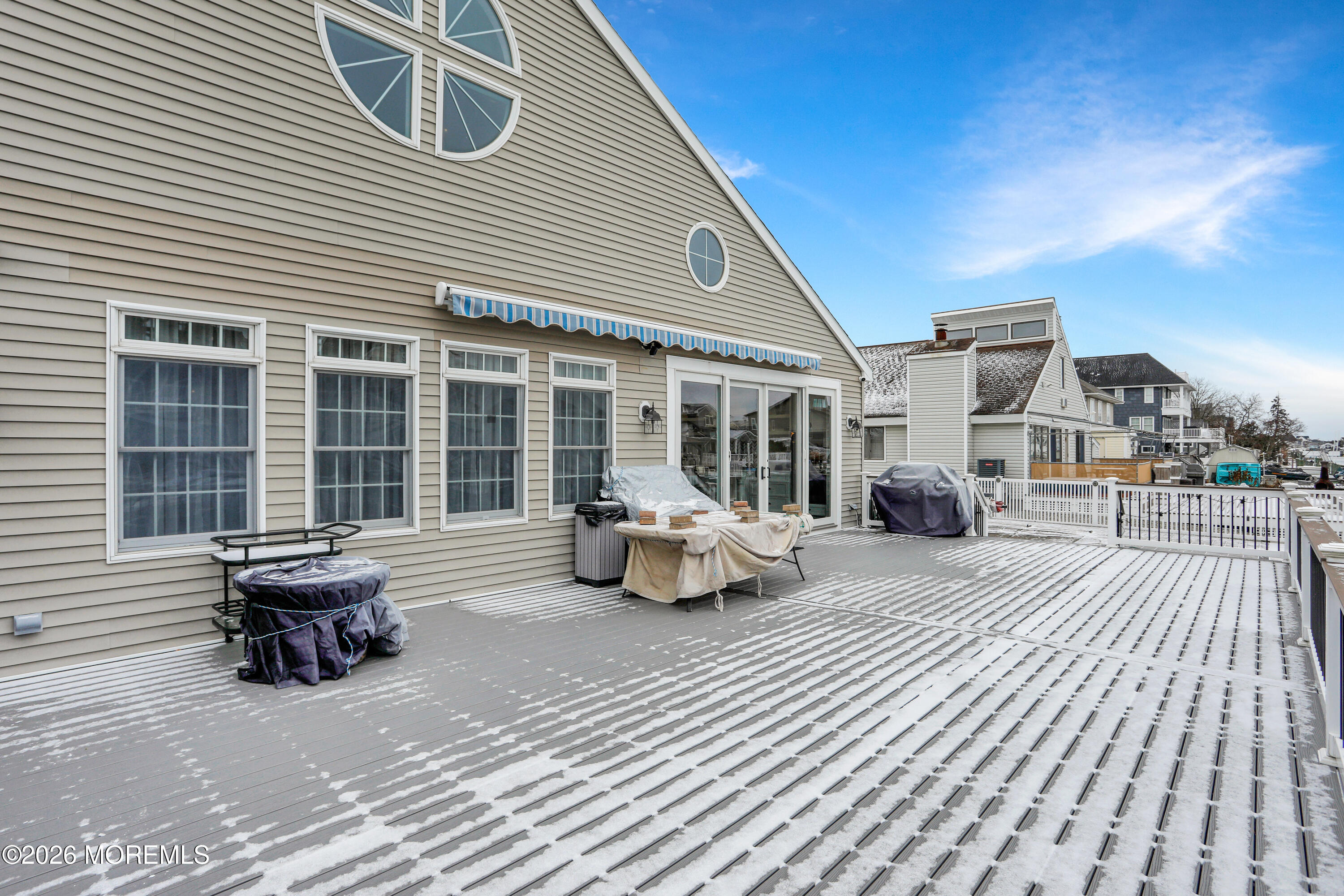 50 Neptune Road Toms River, NJ 08753 - Photo 49 of 73 a view of a patio with table and chairs