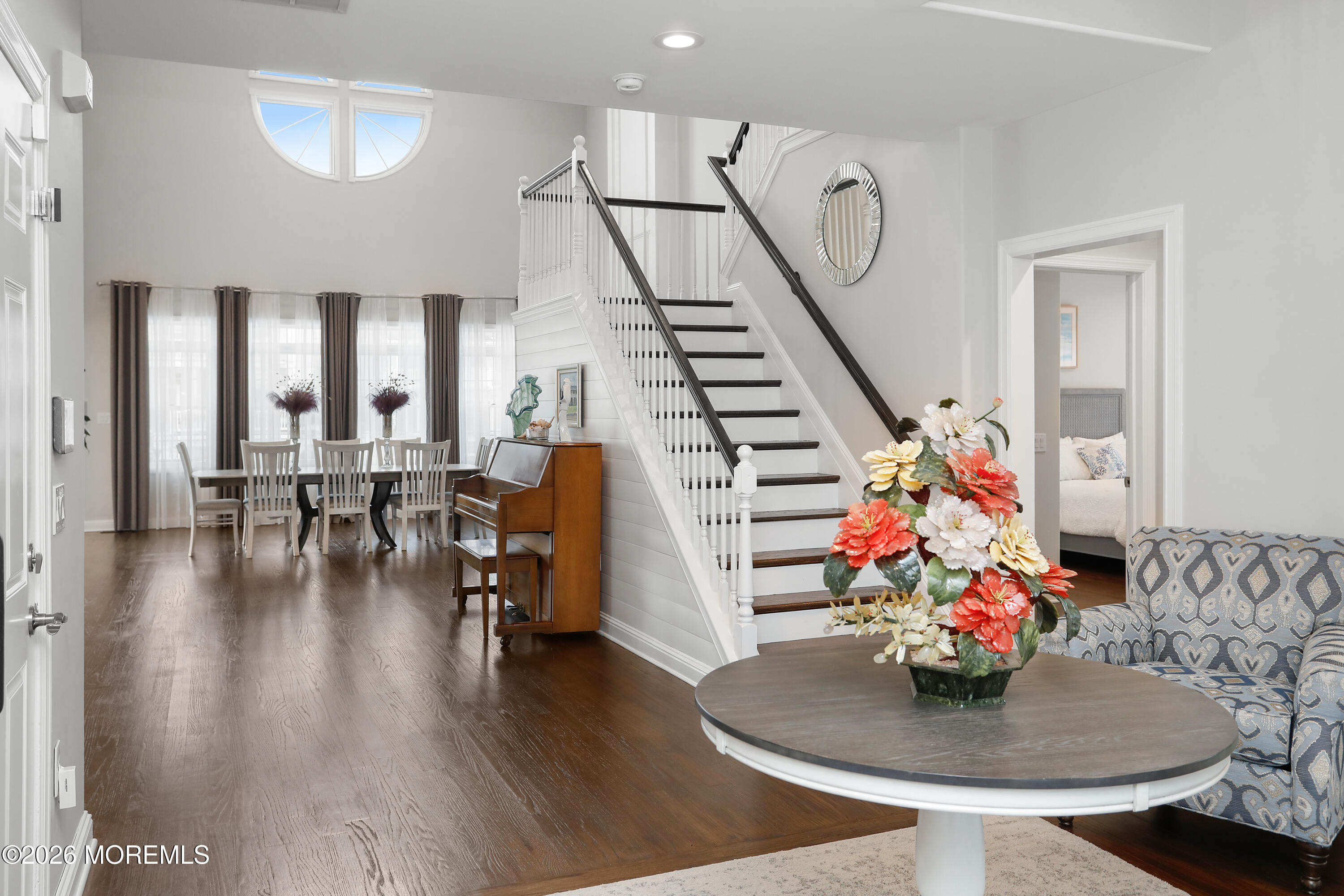 50 Neptune Road Toms River, NJ 08753 - Photo 5 of 73 a dining room with furniture entryway and wooden floor