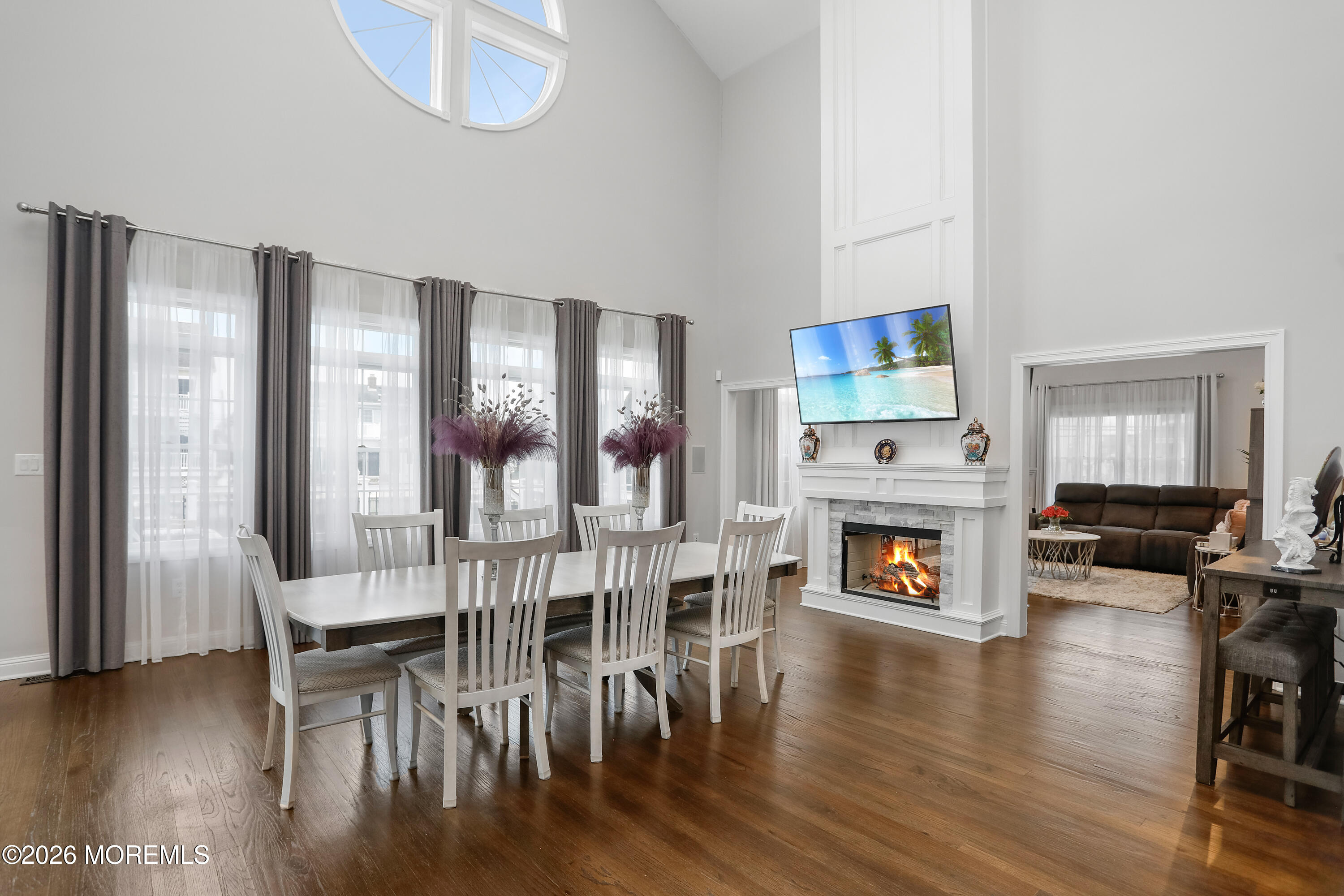 50 Neptune Road Toms River, NJ 08753 - Photo 6 of 73 a view of a livingroom with furniture and a fireplace