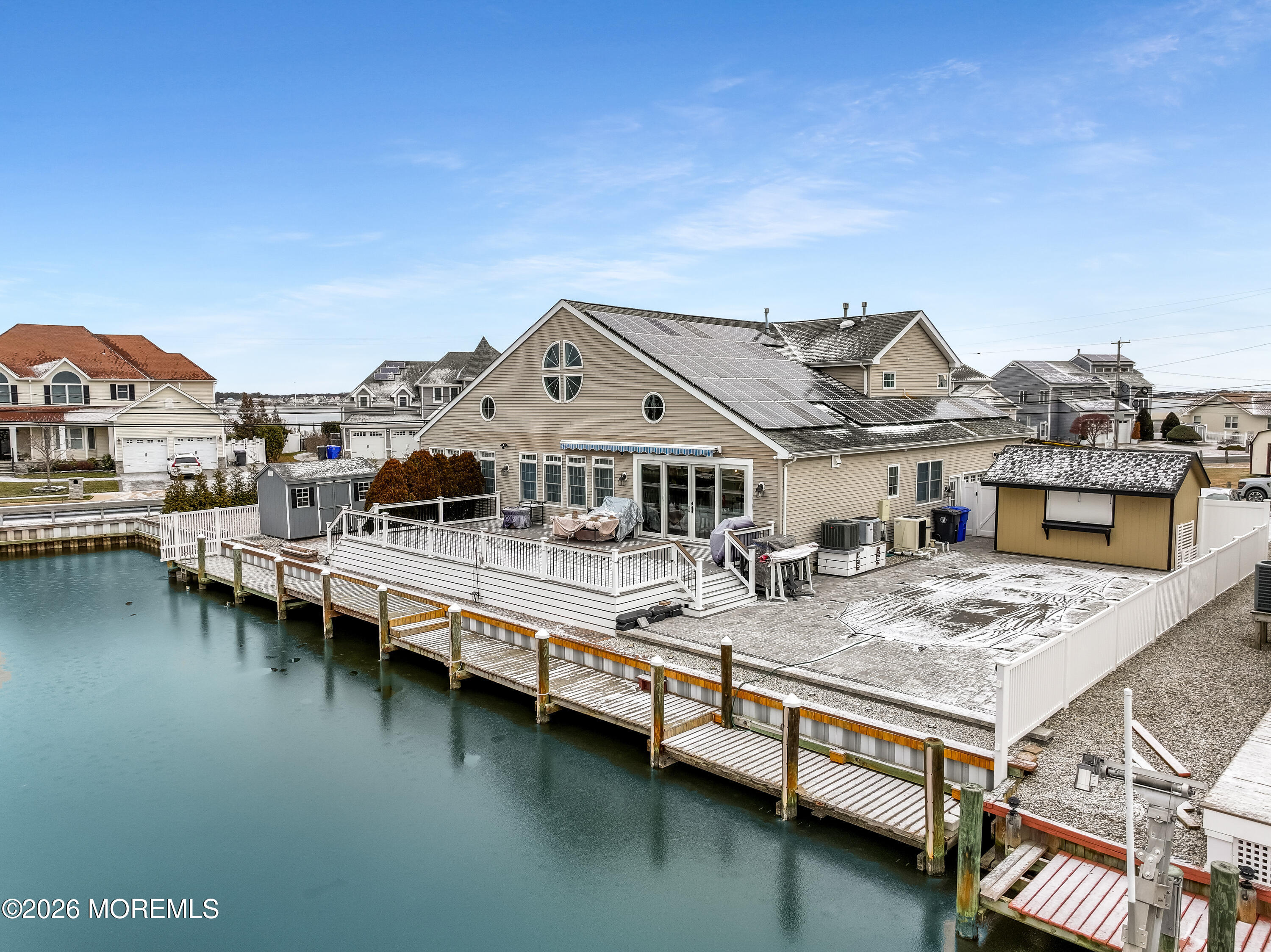50 Neptune Road Toms River, NJ 08753 - Photo 63 of 73 a view of a house with pool and chairs