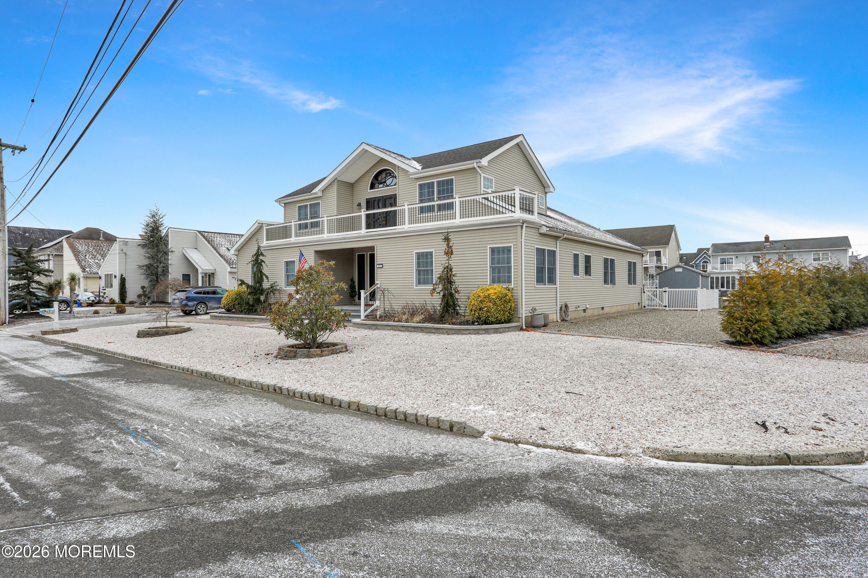 50 Neptune Road Toms River, NJ 08753 - Photo 68 of 73 a view of a white house with a yard