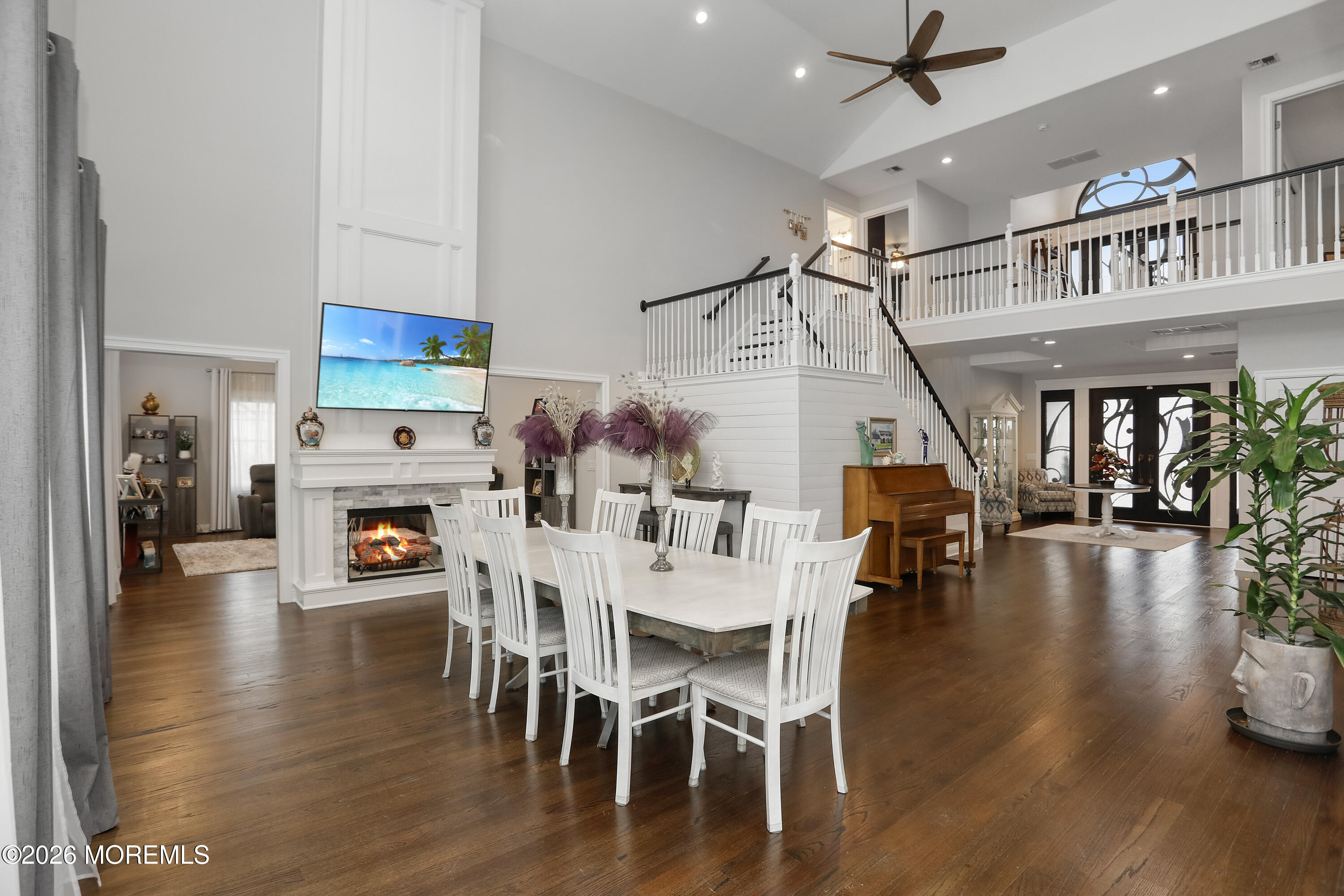 50 Neptune Road Toms River, NJ 08753 - Photo 7 of 73 a dining room with furniture entryway and wooden floor