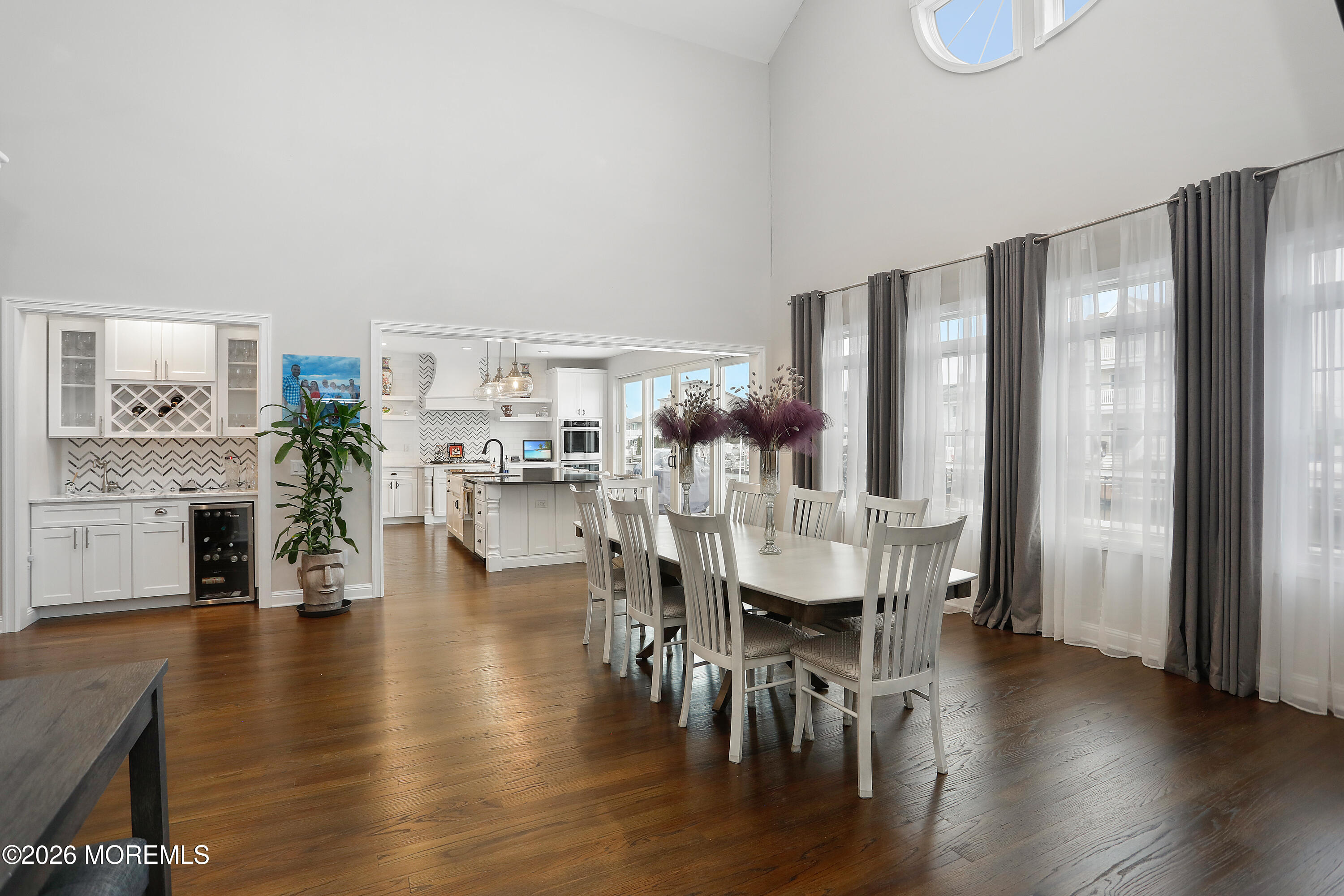50 Neptune Road Toms River, NJ 08753 - Photo 9 of 73 a view of a dining room with furniture and wooden floor