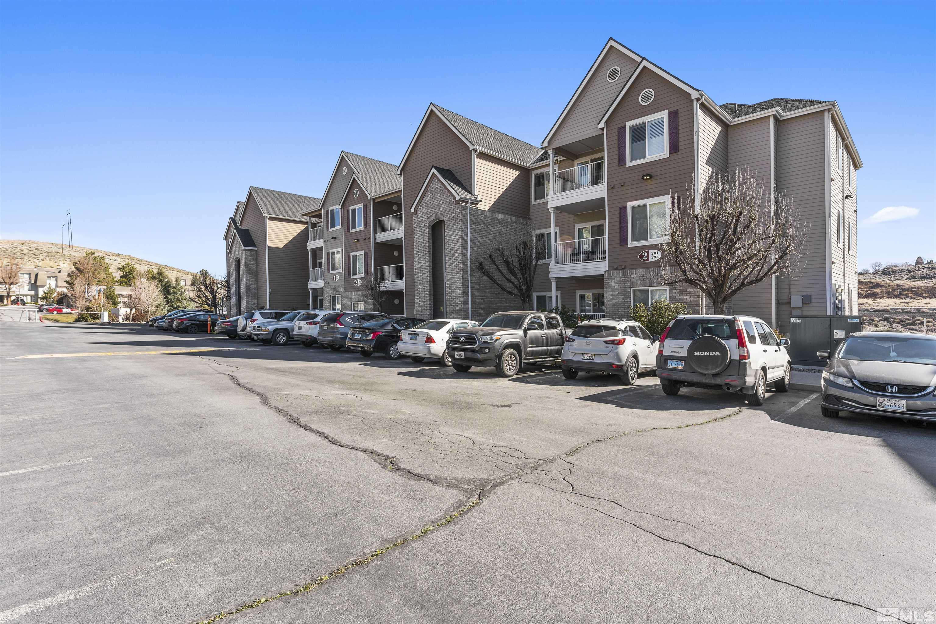 200 Talus Way, Unit 212 Reno, NV 89503 - Photo 3 of 35 a view of a street with cars