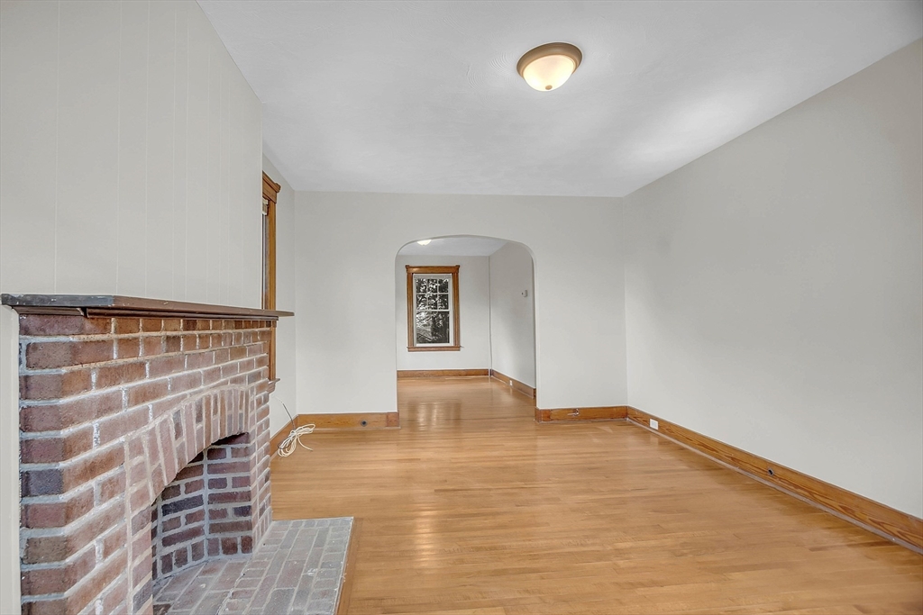 5 Wakefield Street Worcester, MA 01605 - Photo 14 of 42 a bedroom with a bed and a window