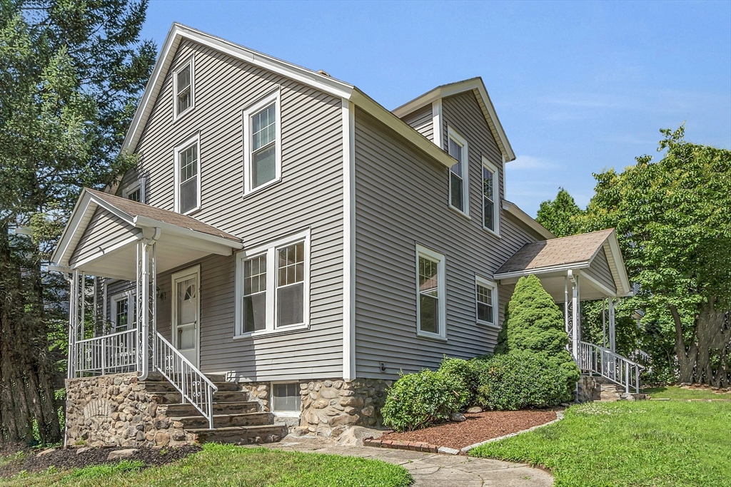 5 Wakefield Street Worcester, MA 01605 - Photo 2 of 42 a front view of a house with garden