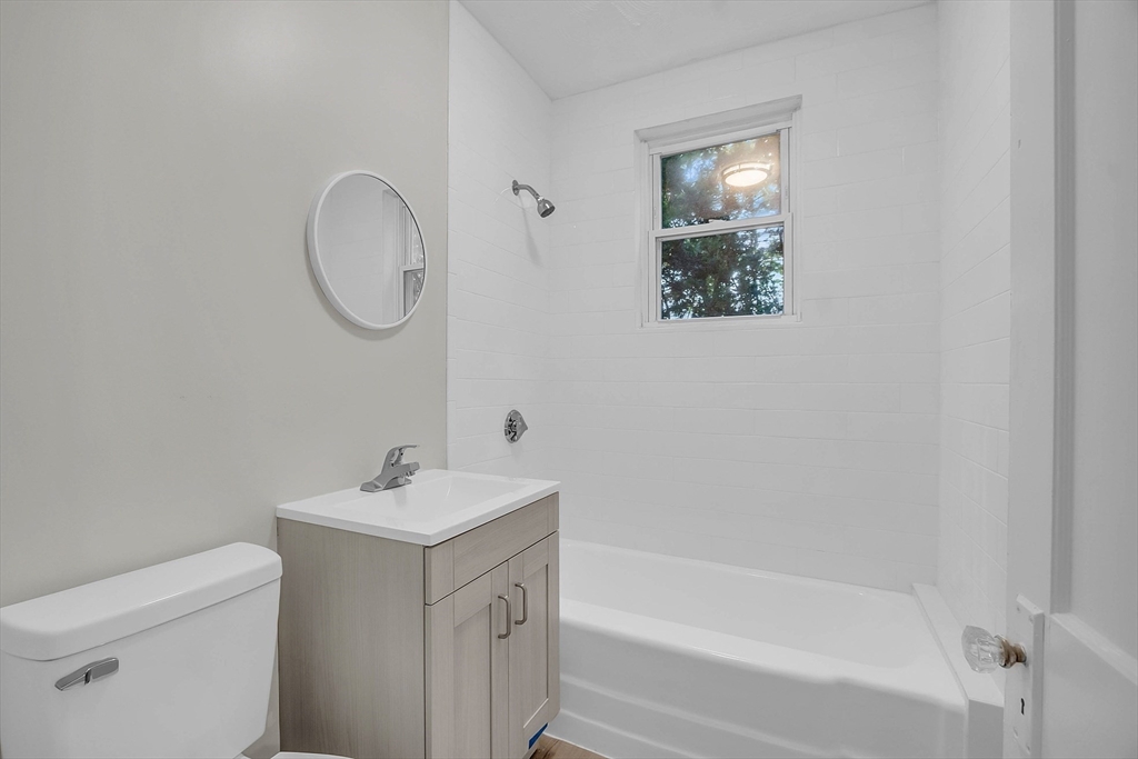 5 Wakefield Street Worcester, MA 01605 - Photo 26 of 42 a bathroom with a sink a toilet and bathtub