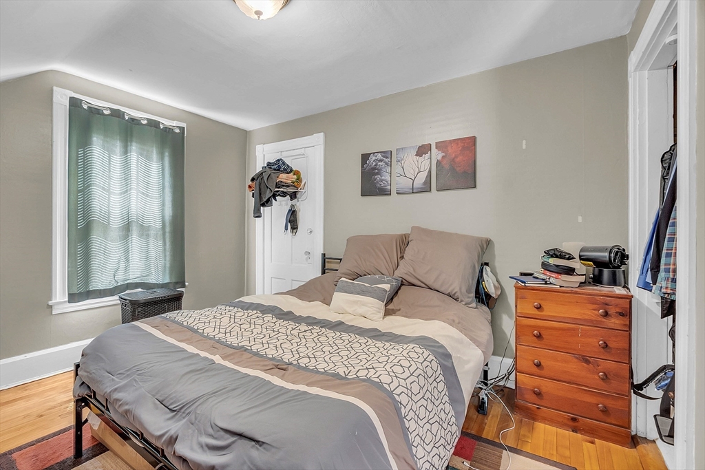 5 Wakefield Street Worcester, MA 01605 - Photo 33 of 42 a bedroom with a bed and a window