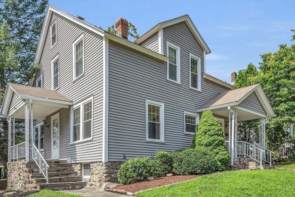 5 Wakefield Street Worcester, MA 01605 - Photo 4 of 42 a front view of a house with plants