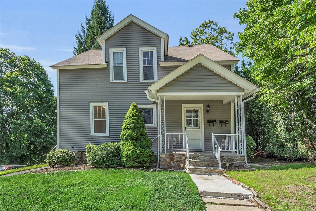 5 Wakefield Street Worcester, MA 01605 - Photo 5 of 42 front view of a house with a yard