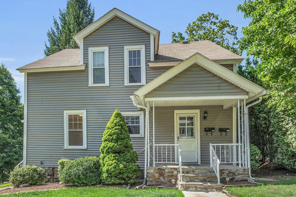 5 Wakefield Street Worcester, MA 01605 - Photo 6 of 42 a view of a house with a yard and potted plants