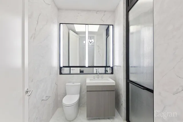 a kitchen with a sink and a stove top oven