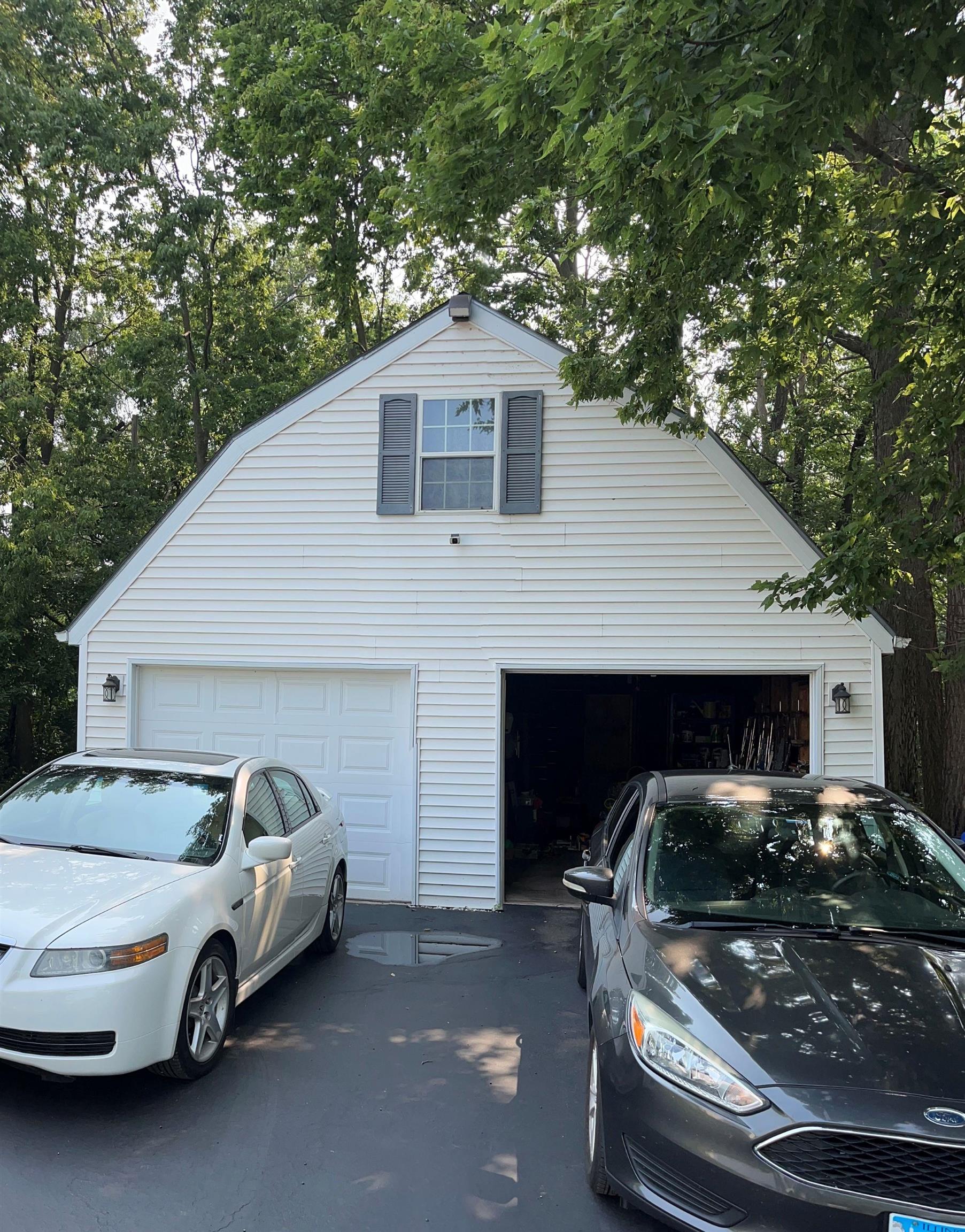 3126 8th Street Rockford, IL 61109 - Photo 2 of 8 a front view of a house with parking space