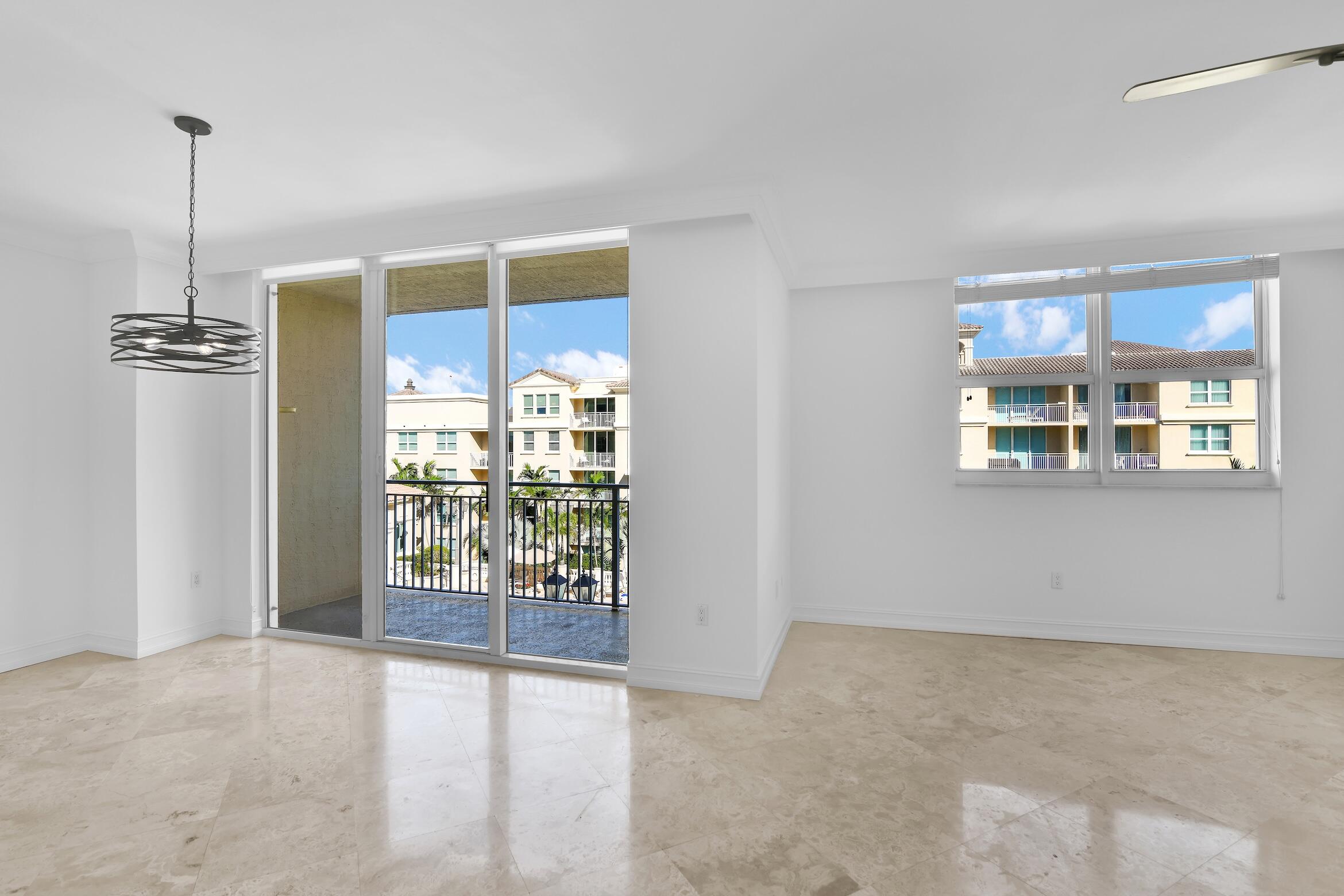 99 Southeast Mizner Boulevard, Unit PH 40 Boca Raton, FL 33432 - Photo 13 of 48 a view of an empty room with a window