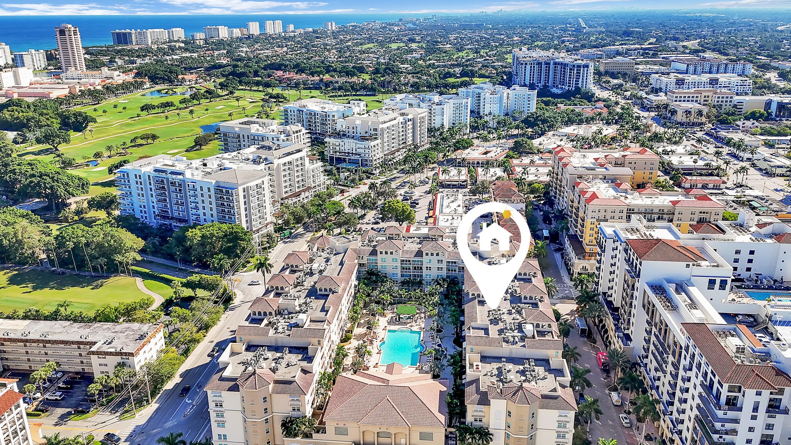 99 Southeast Mizner Boulevard, Unit PH 40 Boca Raton, FL 33432 - Photo 5 of 48 an aerial view of a city with lots of residential buildings