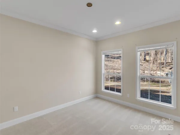 a view of yard with swimming pool