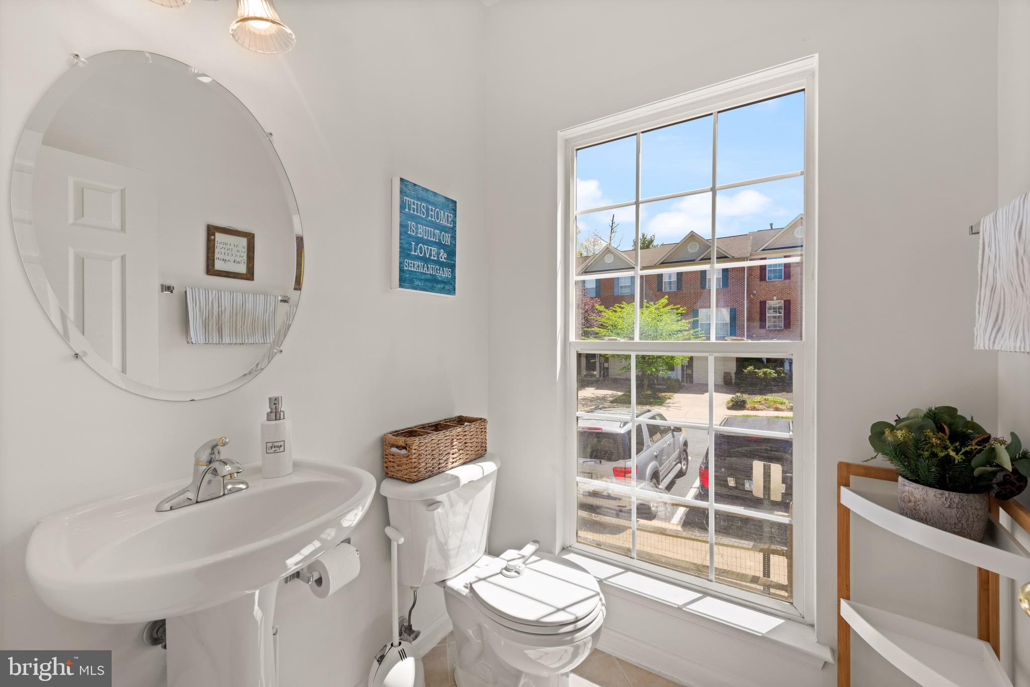 3930 Ballet Way Burtonsville, MD 20866 - Photo 15 of 36 a bathroom with a sink a toilet and a mirror