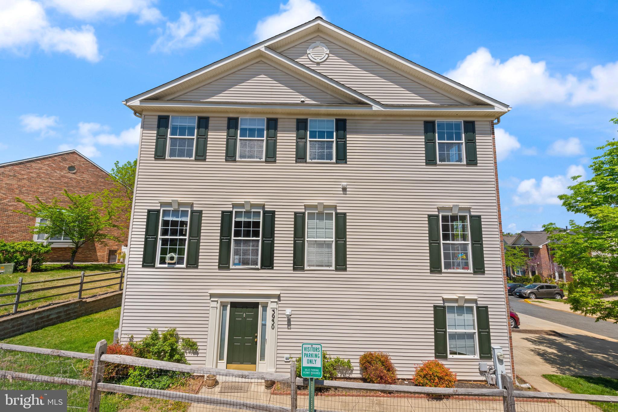 3930 Ballet Way Burtonsville, MD 20866 - Photo 2 of 36 a front view of a house with a yard