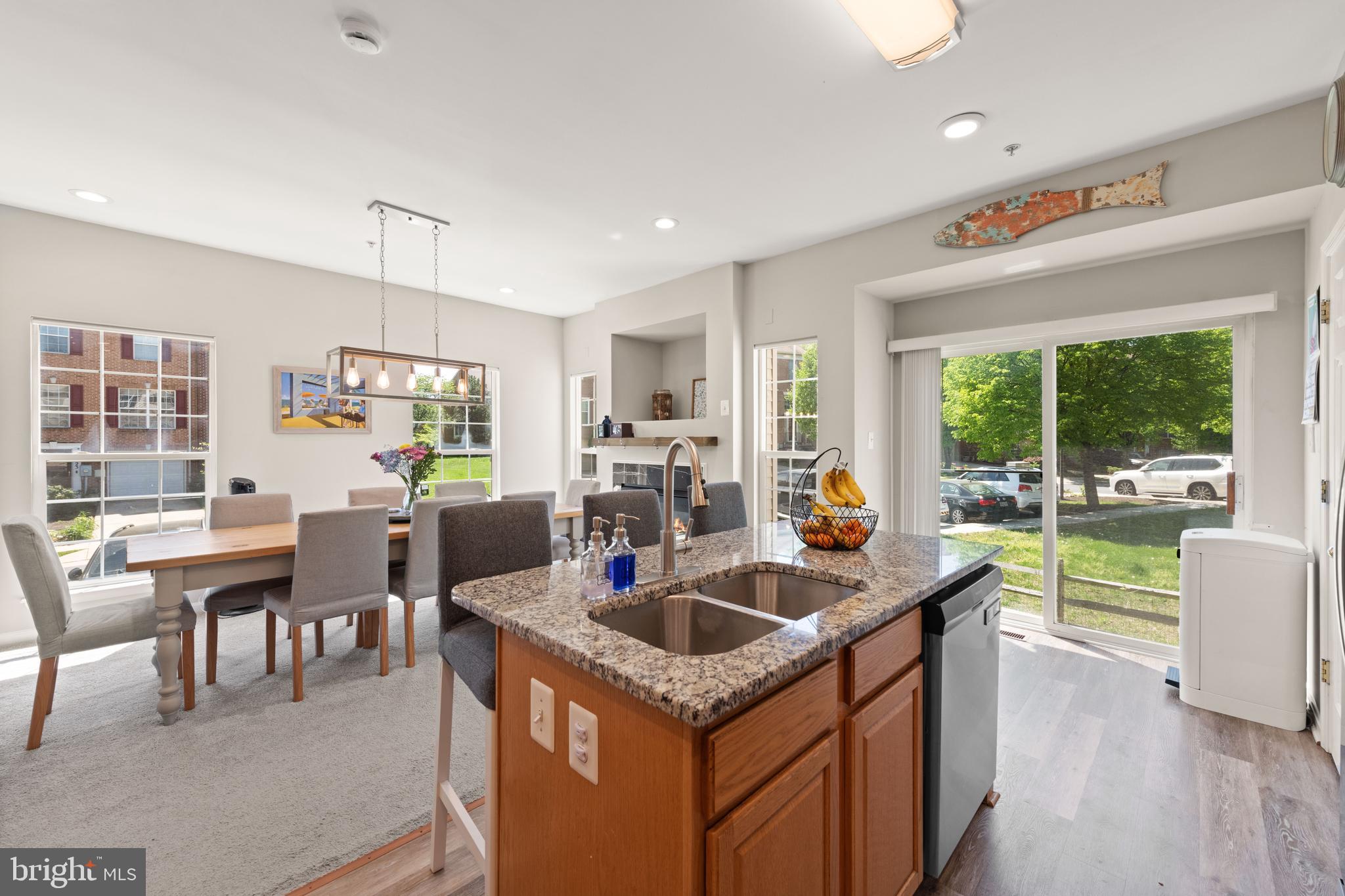 3930 Ballet Way Burtonsville, MD 20866 - Photo 21 of 36 a kitchen that has a table and chairs in it