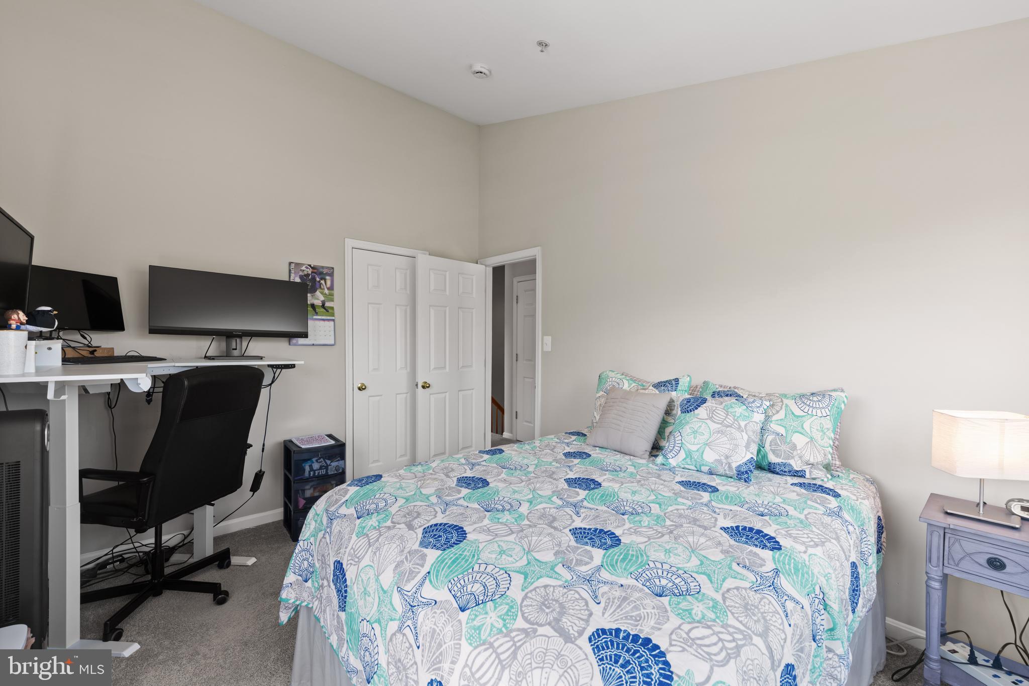 3930 Ballet Way Burtonsville, MD 20866 - Photo 30 of 36 a bedroom with a bed and a chair in it