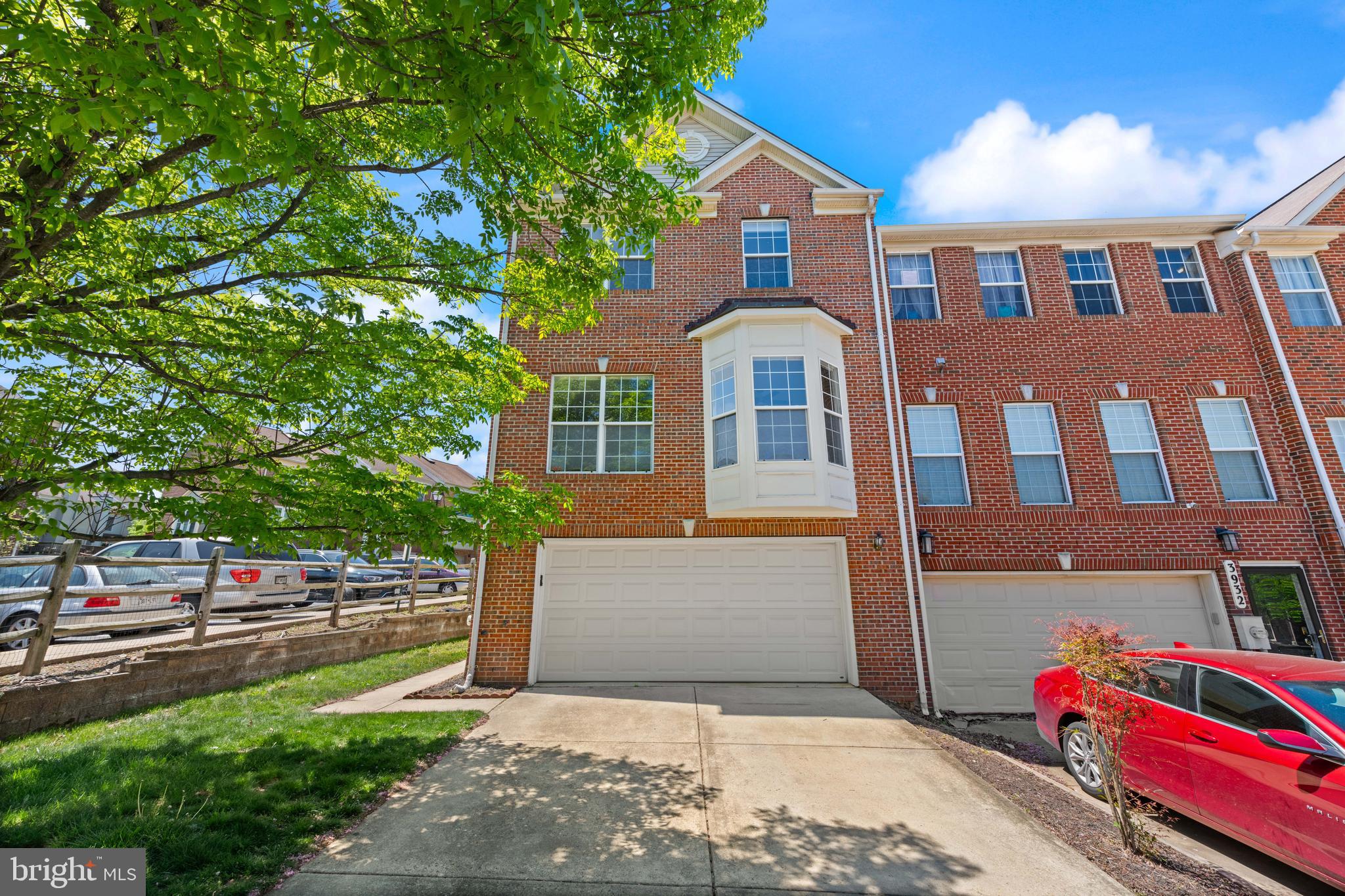 3930 Ballet Way Burtonsville, MD 20866 - Photo 4 of 36 a front view of a house with a yard