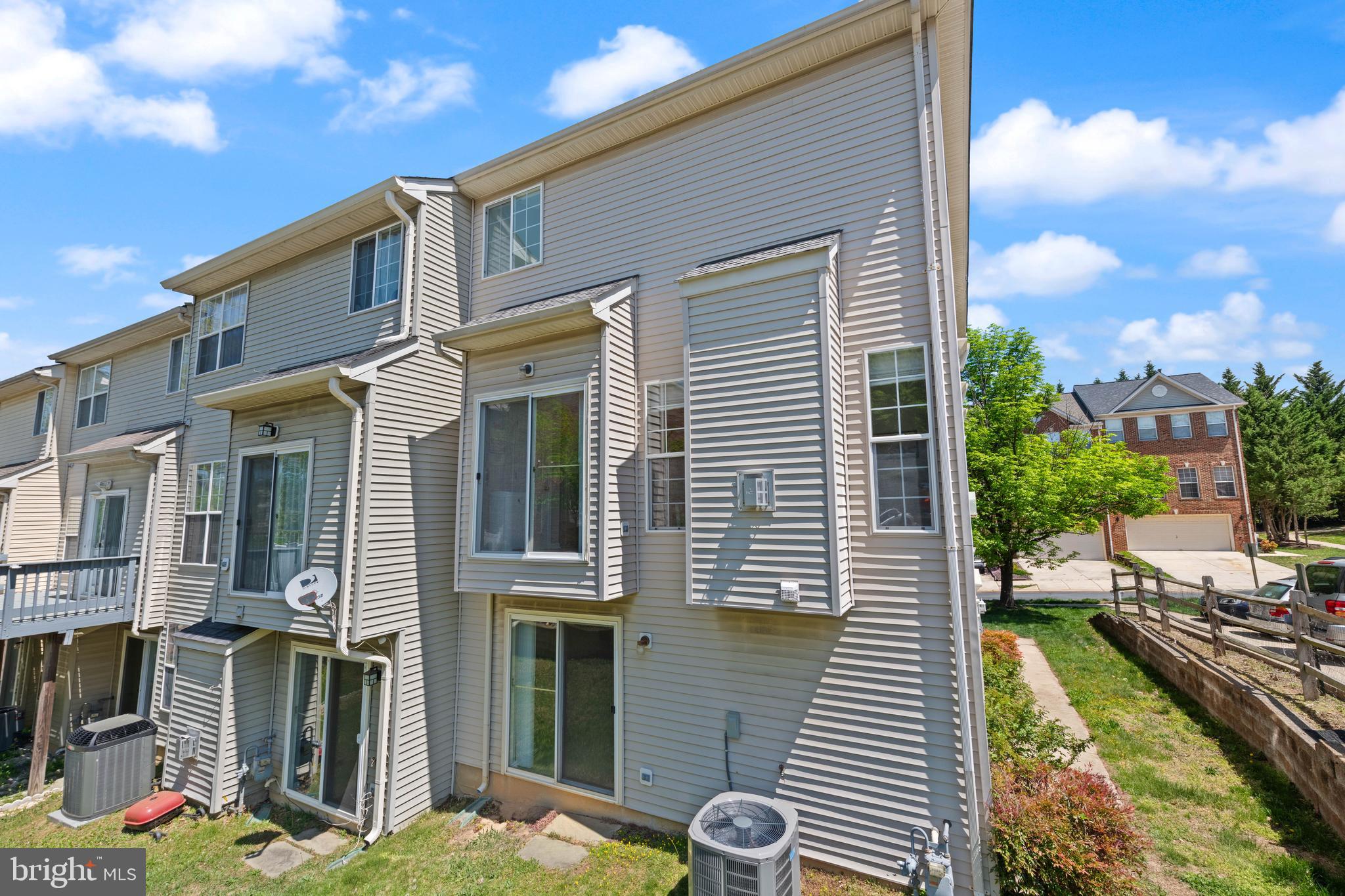 3930 Ballet Way Burtonsville, MD 20866 - Photo 5 of 36 a view of a house with many windows