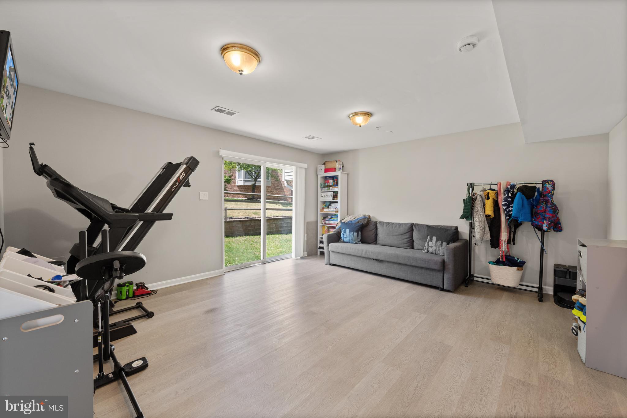 3930 Ballet Way Burtonsville, MD 20866 - Photo 7 of 36 a living room with furniture and a flat screen tv