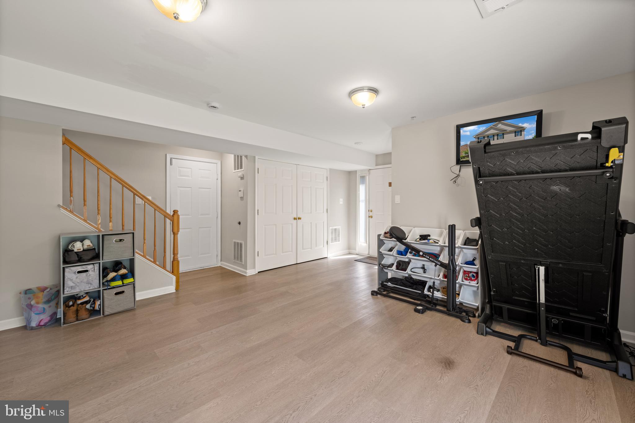 3930 Ballet Way Burtonsville, MD 20866 - Photo 9 of 36 a view of a livingroom with gym equipment