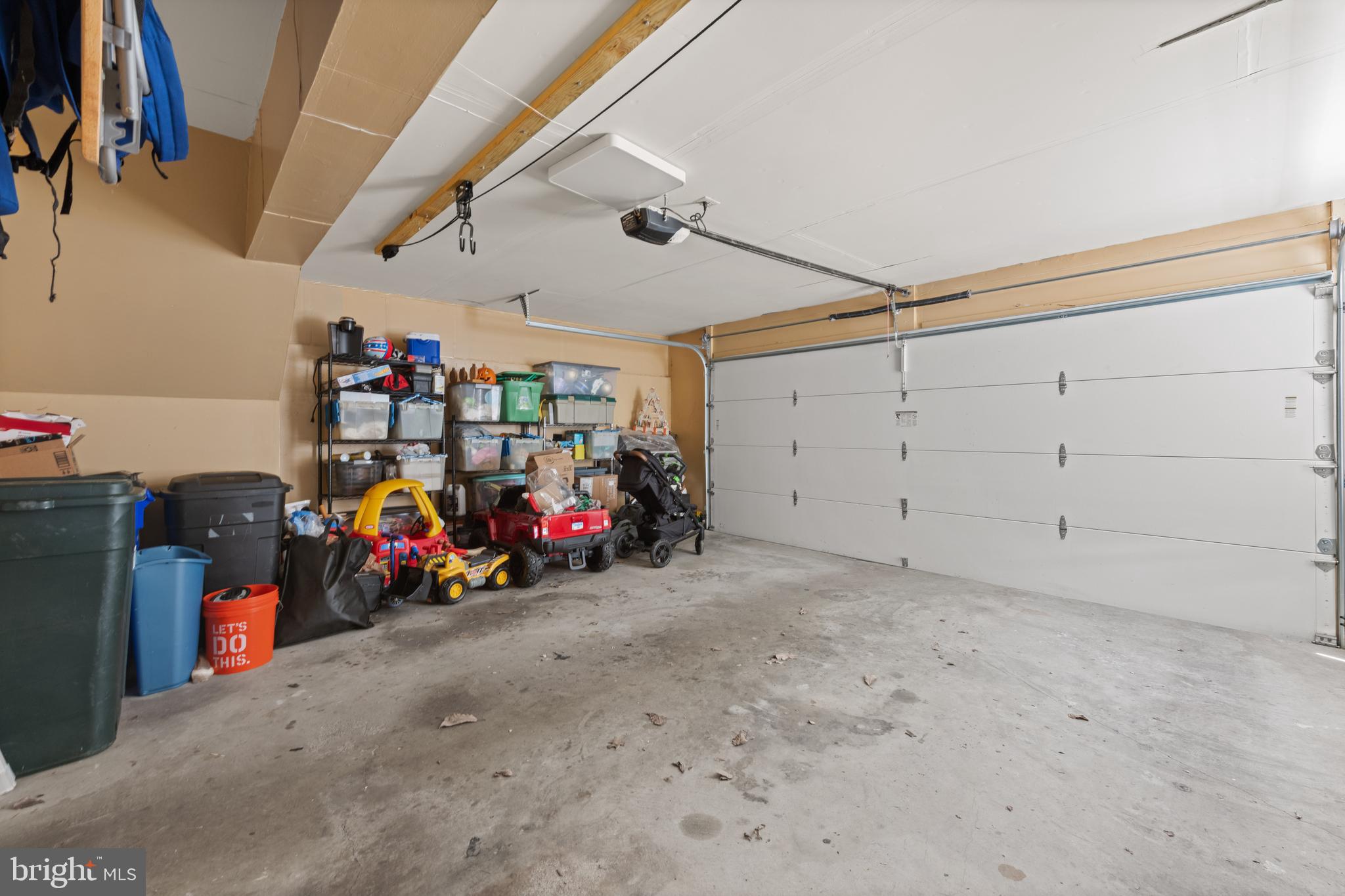 3930 Ballet Way Burtonsville, MD 20866 - Photo 10 of 36 a view of a garage with a bike and storage