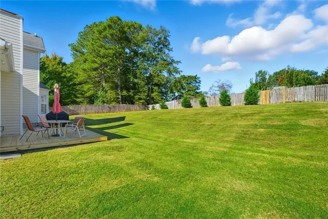 a view of a park with swings and slides