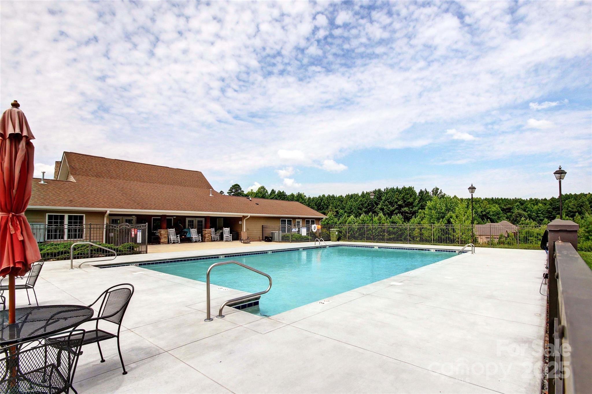 2005 Marina Pointe Road Salisbury, NC 28146 - Photo 12 of 16 a view of a patio with a table and chairs