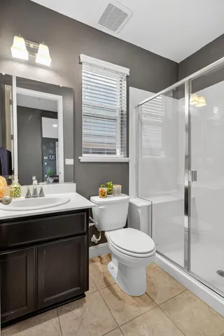 a view of a livingroom with stairs